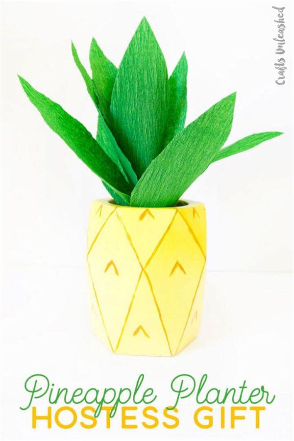 Supplies needed to make a DIY pineapple planter: