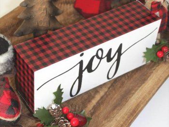 This red buffalo plaid Christmas joy block is super easy to make and looks amazing with lots of other fun Christmas decor.